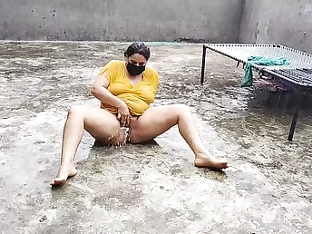 Desi Mother Mummy and Pakistani Dame Get Moist and Horny in the Rain