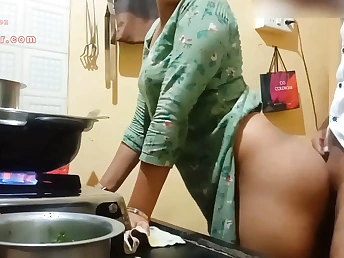 Observe this Indian COUGAR with a ample booty get down and sloppy in the kitchen