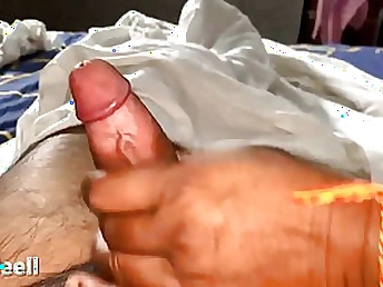 Lush Indian lady is providing a hand job to her paramour and hoping to get banged, too